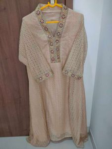 Elegant Beige Embroidered Kurti