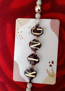 Rakhi GNIK Initial Pearl