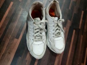 2 Pair Of White Shoes