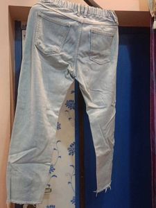 Ripped Light Wash Denim Jeans