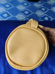 Stylish Mustard Circular Sides Sling Bag