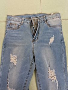 Ripped Light Wash Jeans