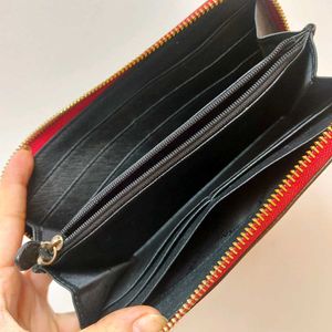 Authentic Imported DKNY zip-around wallet