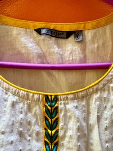 White Embroidered Sleeveless Kurti