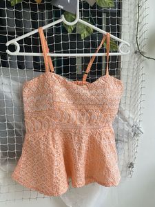 Embroidered Peplum Top