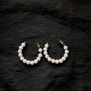 White Pearl Hoop Earrings.