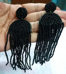 Long Neck Piece And Black Earrings