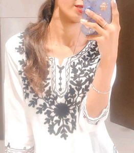 Elegant White Embroidered kurti
