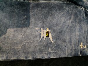 Distressed Denim Jeans