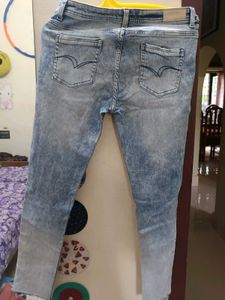 Lee Cooper slightly ripped jeans.