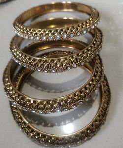 Elegant Gold Tone Bangle Set