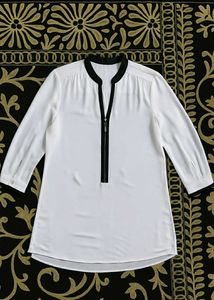 Chic White Blouse with Black Trim