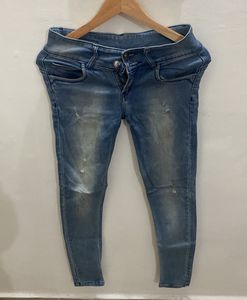 Distressed Denim Jeans