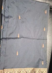 Elegant Grey Saree With Golden Border