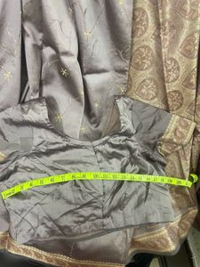 Fully embroidered greyish mauve colour silk saree