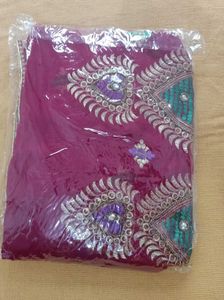 Elegant Maroon Embroidered Saree