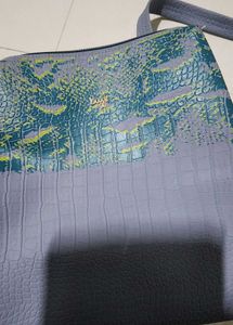 Baggit Textured Blue Backpack Bag