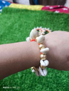 ✨ ट्रेडिशनल शंख और मोती वाली डिजाइनर राखी फॉर वुमन