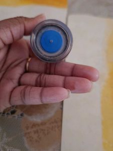 Silver Beaded Bracelet Set and a blue gel eyeliner