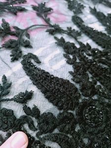 new beautiful embroidered black stone net saree.