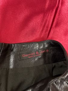 Pleated Black Leather Skirt