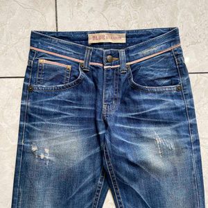 Distressed Wash Jeans