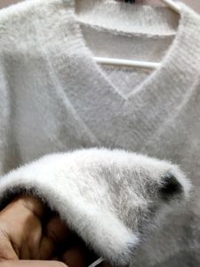 premium imported white V-neck mohair sweater.