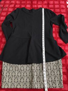 Black Peplum Top with Patterned Skirt