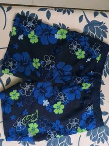 DISNEY Floral mens swimming Costume/ Beach Shorts