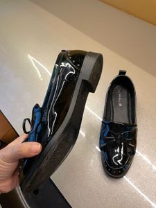 new bright shiny black westside loafers