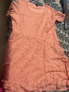 Knee Length Net Bright Peach Dress With Brown Belt