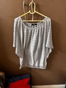 Gray Knit top with cut out design