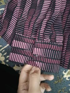 Mauve shirt.