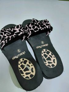 SkyTrap Animal Print flip flops.