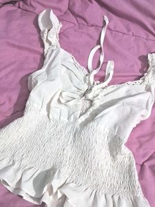 Cute White Top With Cutout Boarder Front Tying