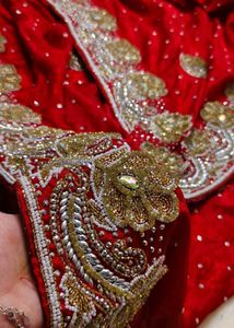 Red. heavy Embroidered. expansive 💯 saree