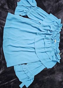 Its a Sky Blue Off Shoulder Top from AND