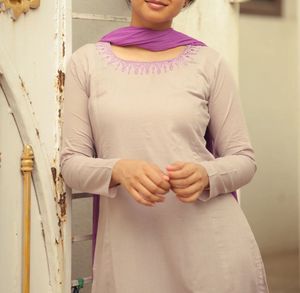 Grey aline top paired with purple dupatta