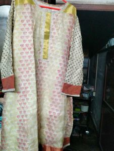 Cream Printed Nice Kurti.