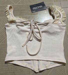 Revolte Ivory Ruffle Corset Top