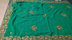 Elegant rama colour Embroidered Saree