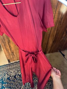Red belted jumpsuit