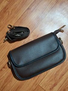 brown sling bag