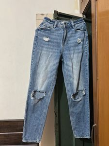 Ripped Knee Jeans