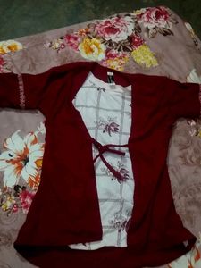 Stylish Maroon Top with Floral Accents