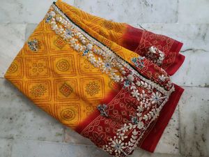 Red and yellow bandhni saree