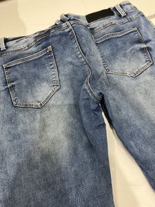 Mid Rise Blue Denim Jeans
