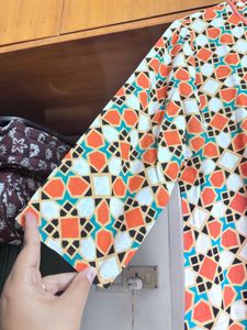 “Yufta” Vibrant Orange Geometric Dress