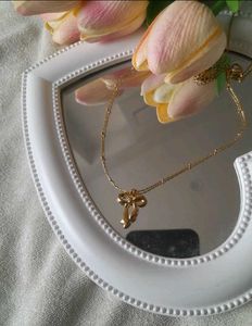 Bow Infinity Pendant Necklace (Anti Tarnish)