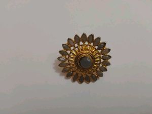 Gold tone floral adjustable ring